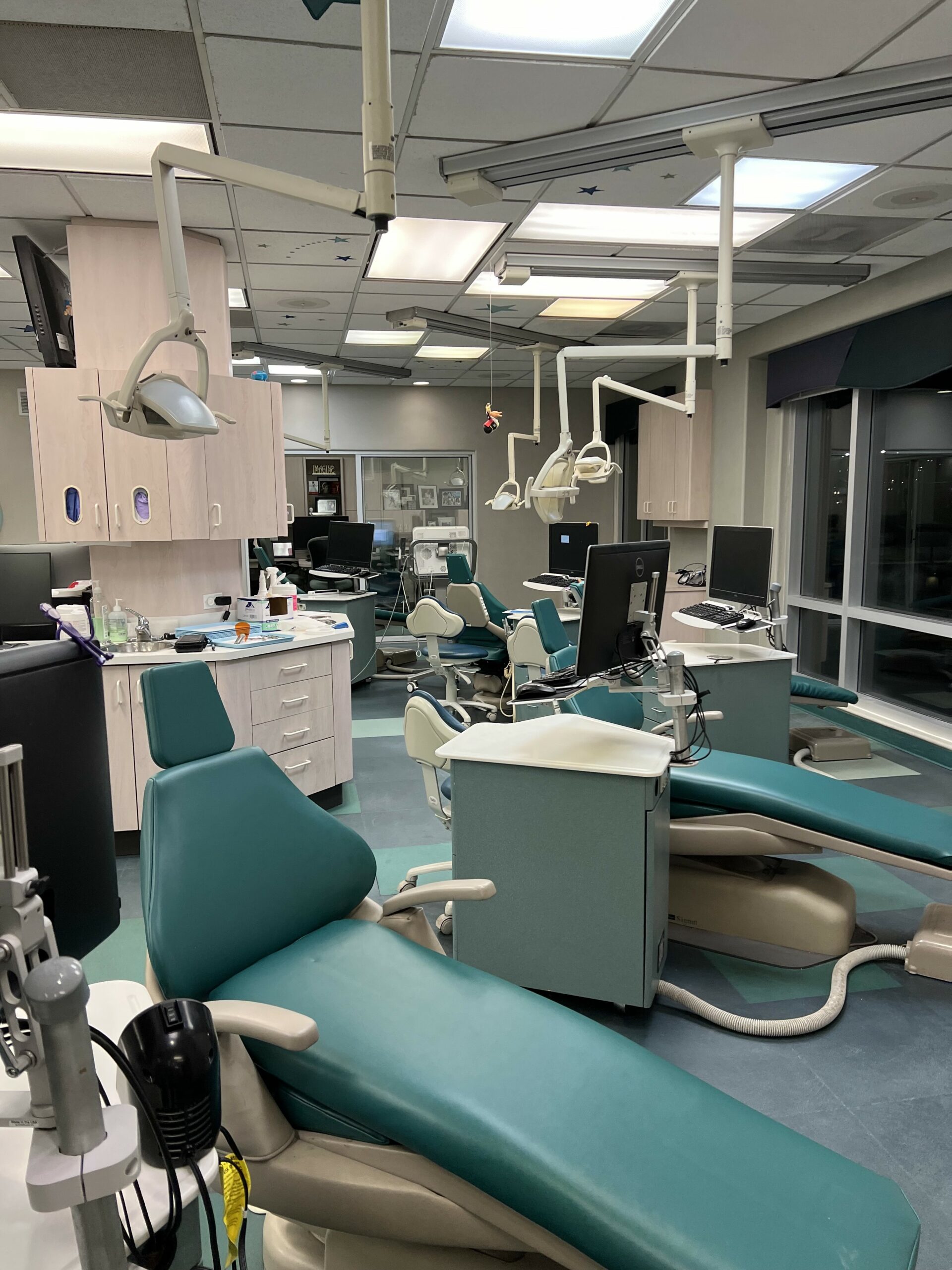 multiple dental chairs in an operating room